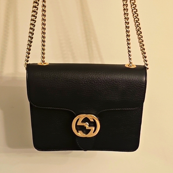 Gucci Handbags - Authentic Gucci Interlock Black Crossbody Bag with Gold Accents